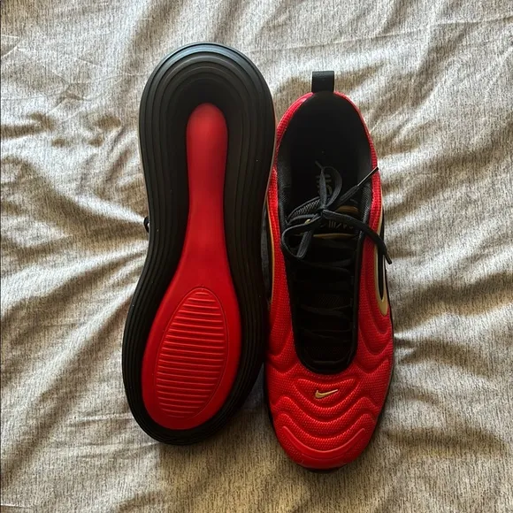 Red Nike Sneakers with Black and Gold Accents