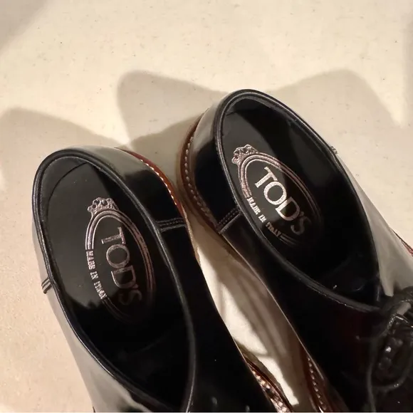 Tod’s Patent Leather Shearling Lace Up Fringe Loafers Black Size 38.5/8.5