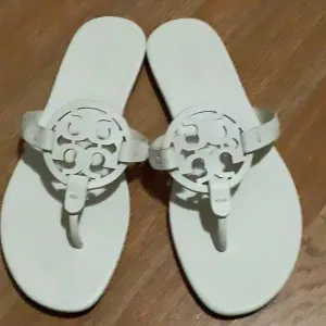 Tory Burch White Sandals with Medallion Detail