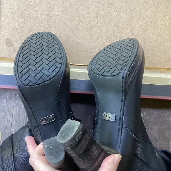 Ugg black leather heeled boots with strap detail, size 9