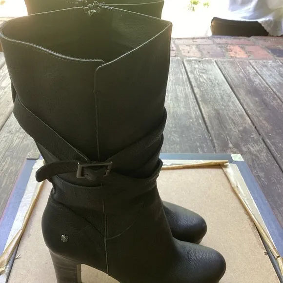 Ugg black leather heeled boots with strap detail, size 9