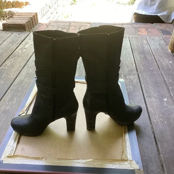 Ugg black leather heeled boots with strap detail, size 9