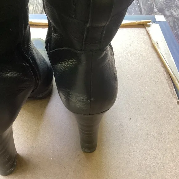 Ugg black leather heeled boots with strap detail, size 9
