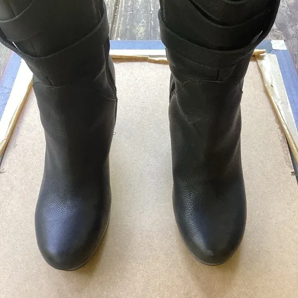 Ugg black leather heeled boots with strap detail, size 9