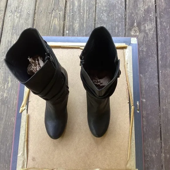 Ugg black leather heeled boots with strap detail, size 9