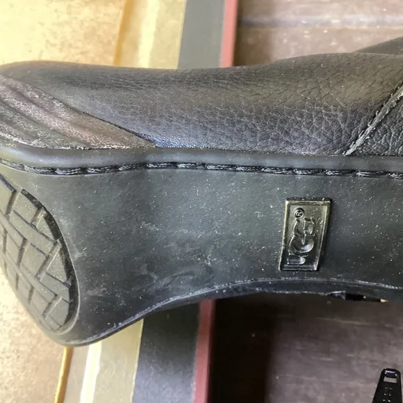 Ugg black leather heeled boots with strap detail, size 9