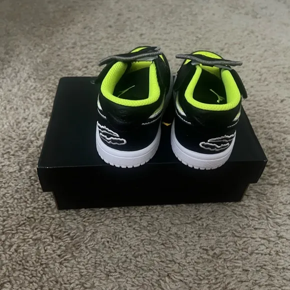 Vibrant Neon Green and Black Jordan 1 low
