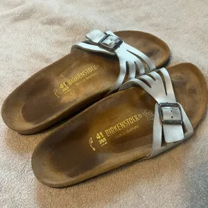 women’s single strap silver metallic buckle birkenstocks sandals size 41